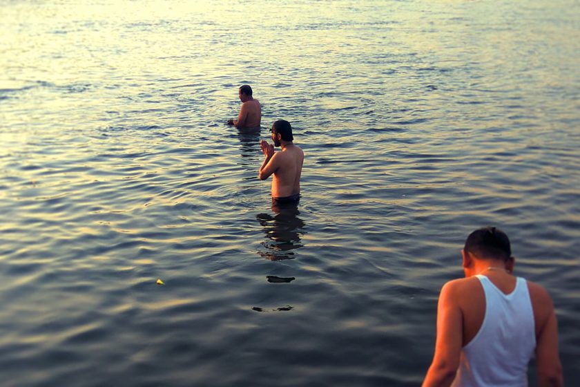Dipping in Narmada River